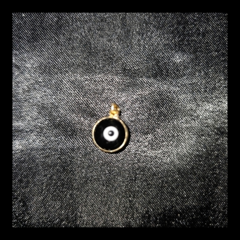 Black evil eye pendant